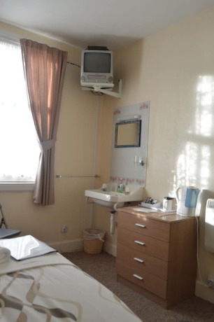 Imagen de la habitación del Hotel Belgrave Arms. Foto 11