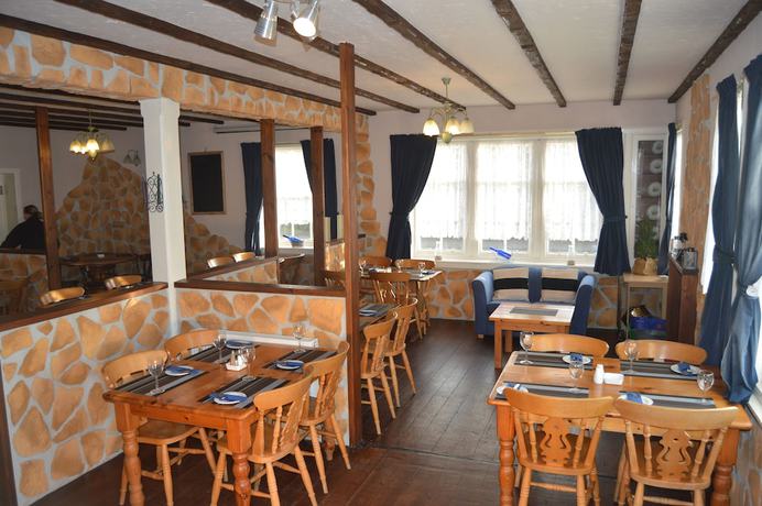 Imagen del bar/restaurante del Hotel Belgrave Arms. Foto 6