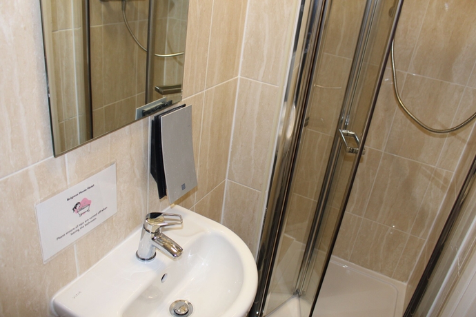 Imagen de la habitación del Hotel Belgrave House. Foto 10