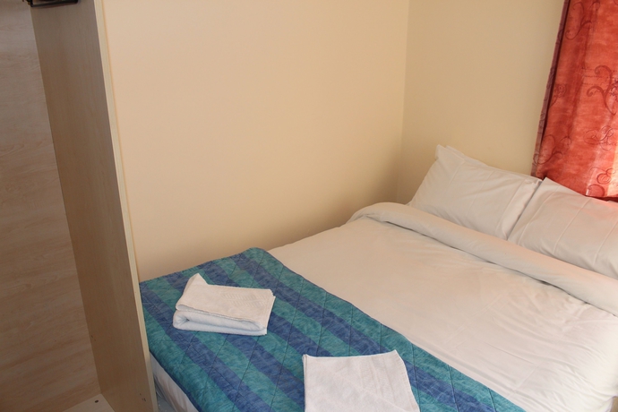 Imagen de la habitación del Hotel Belgrave House. Foto 13