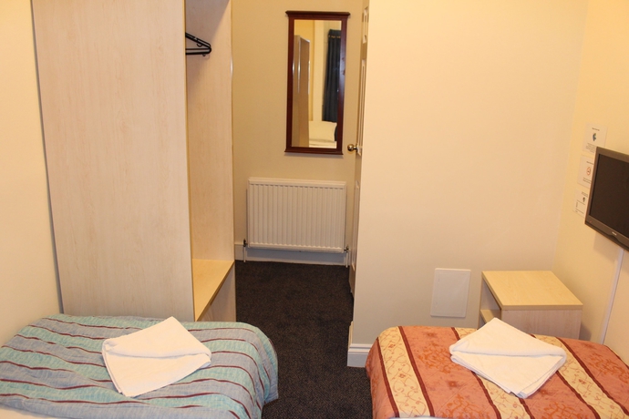 Imagen de la habitación del Hotel Belgrave House. Foto 15