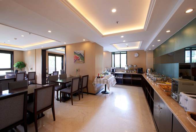 Imagen de la habitación del Hotel Belgravia Serviced Residence Wuxi. Foto 10