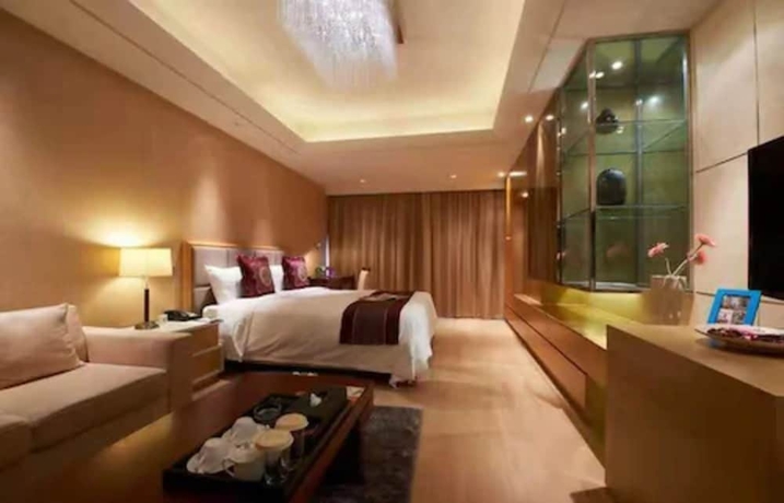 Imagen de la habitación del Hotel Belgravia Suites Wuxi. Foto 4