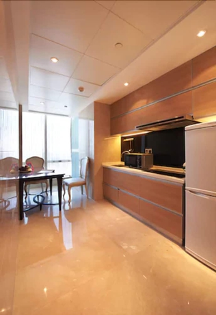 Imagen de la habitación del Hotel Belgravia Suites Wuxi. Foto 7
