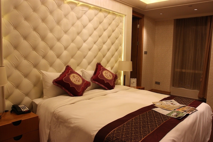 Imagen de la habitación del Hotel Belgravia Suites Wuxi. Foto 12