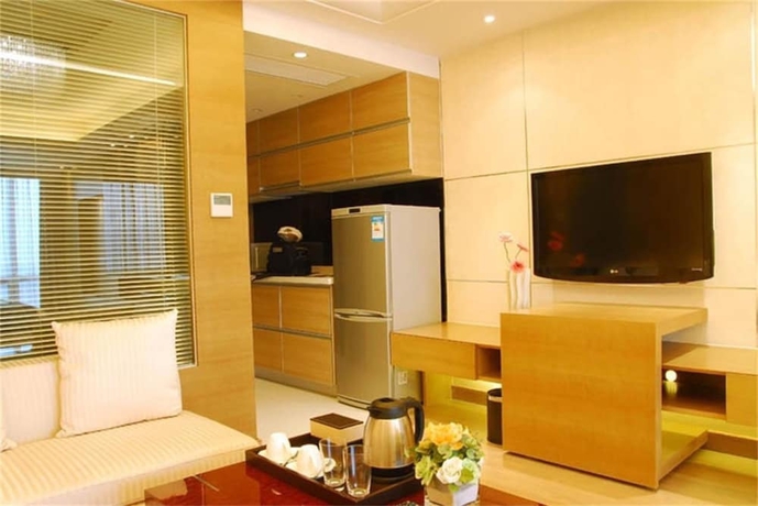 Imagen de la habitación del Hotel Belgravia Suites Wuxi. Foto 13