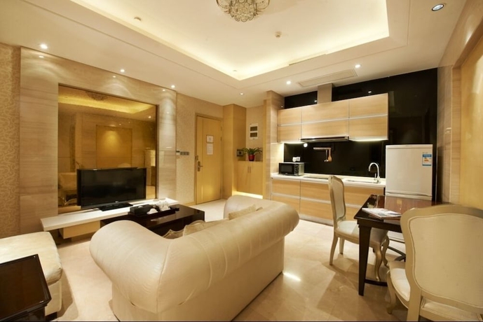 Imagen de la habitación del Hotel Belgravia Suites Wuxi. Foto 14