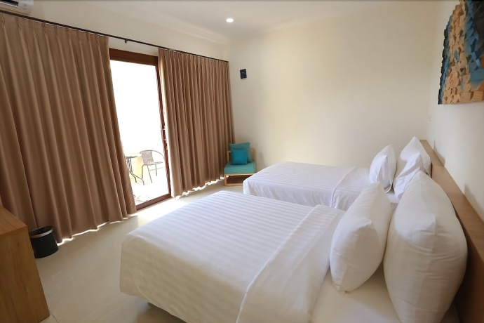 Imagen de la habitación del Hotel Belitung Holiday Resort. Foto 4