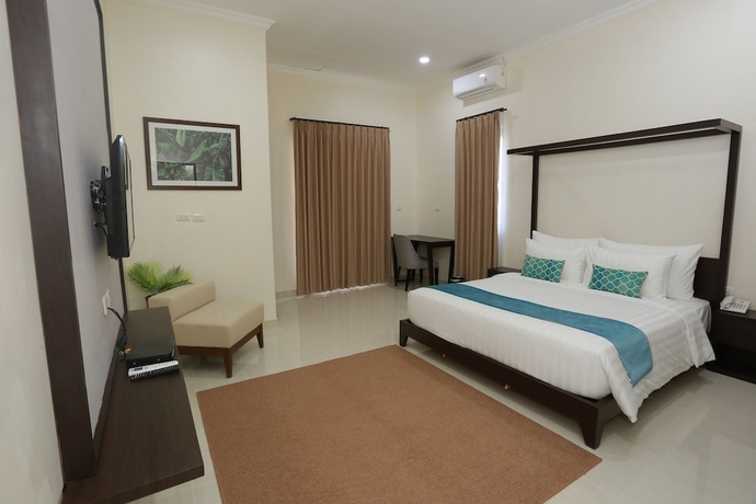 Imagen de la habitación del Hotel Belitung Holiday Resort. Foto 8
