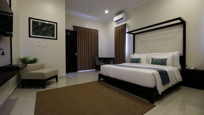 Imagen de la habitación del Hotel Belitung Holiday Resort. Foto 9