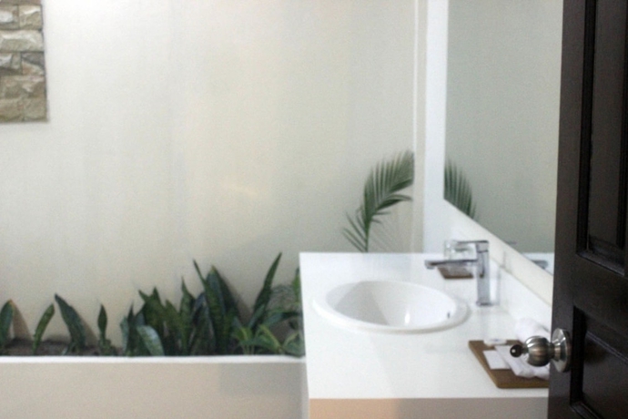 Imagen de la habitación del Hotel Belitung Holiday Resort. Foto 18