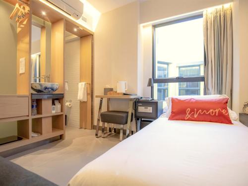 Imagen de la habitación del Hotel Belive and More. Foto 8