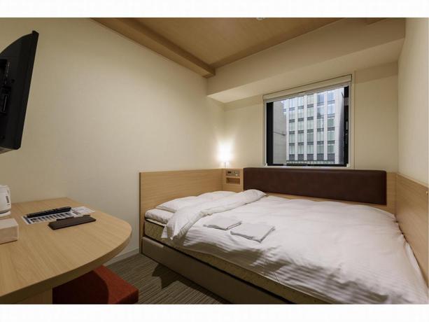 Imagen de la habitación del Hotel Belken Hotel Tokyo. Foto 4