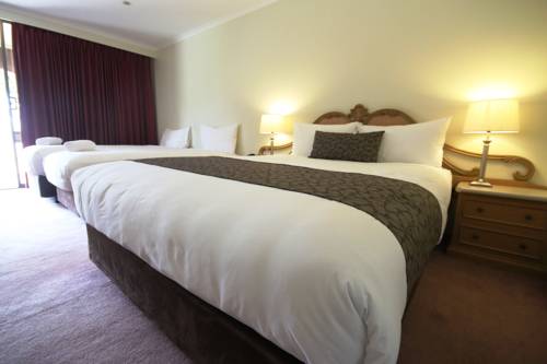 Imagen de la habitación del Hotel Bell Tower Inn. Foto 2