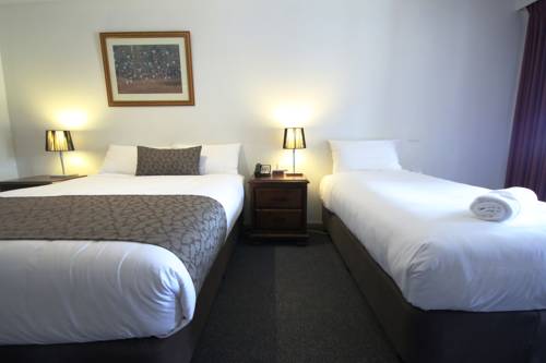 Imagen de la habitación del Hotel Bell Tower Inn. Foto 3
