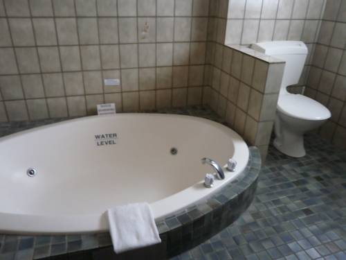 Imagen de la habitación del Hotel Bell Tower Inn. Foto 6