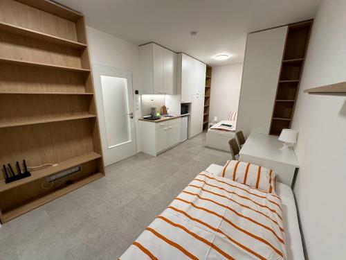 Imagen de la habitación del Hotel Bella Apartments Brno. Foto 12