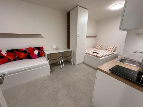 Imagen de la habitación del Hotel Bella Apartments Brno. Foto 13