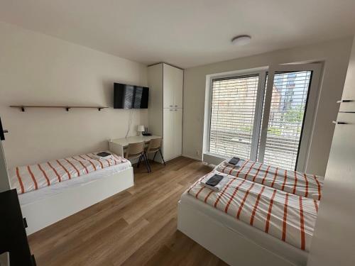 Imagen de la habitación del Hotel Bella Apartments Brno. Foto 19