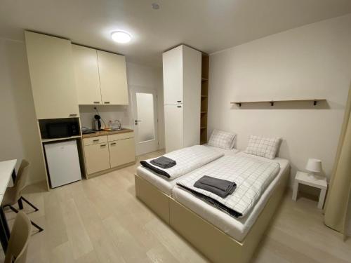 Imagen de la habitación del Hotel Bella Apartments Brno. Foto 20