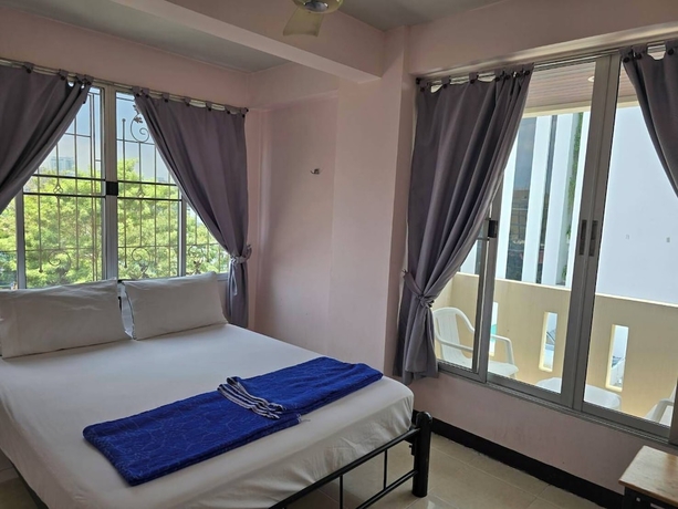 Imagen de la habitación del Hotel Bella Bella River View. Foto 6