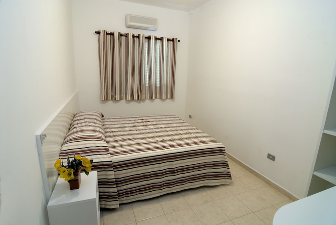 Imagen de la habitación del Hotel Bella Casa Flat Service. Foto 7