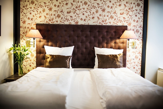 Imagen de la habitación del Hotel Bella Grande. Foto 5