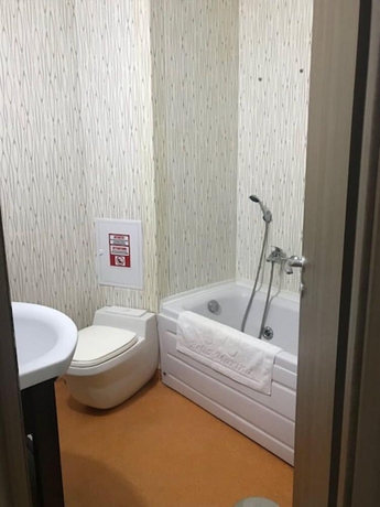 Imagen de la habitación del Hotel Bella Marina. Foto 14