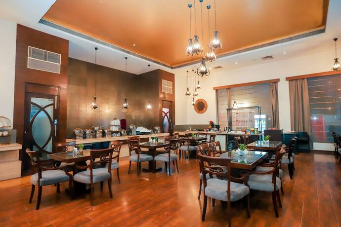 Imagen del bar/restaurante del Hotel Bel-la Mondes Nh-8. Foto 17