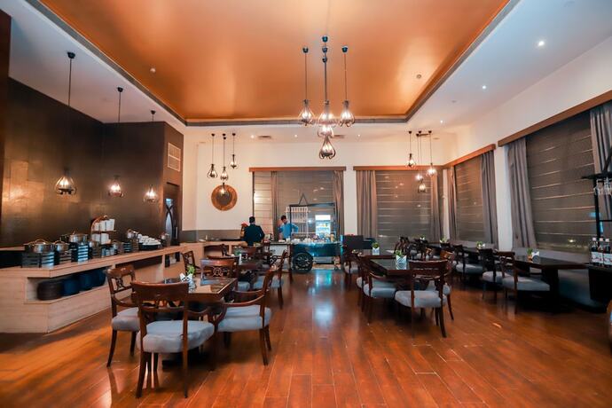 Imagen del bar/restaurante del Hotel Bel-la Mondes Nh-8. Foto 19