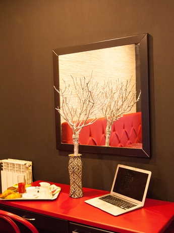 Imagen de la habitación del Hotel Bella Napoli. Foto 10