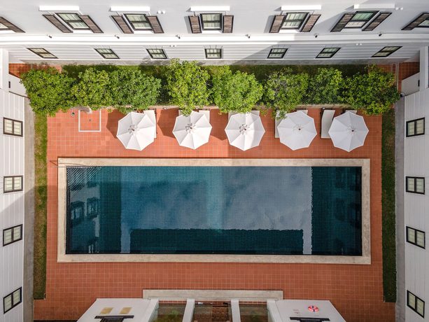 Imagen de la piscina del Hotel Bella Nara Chiang Mai. Foto 20