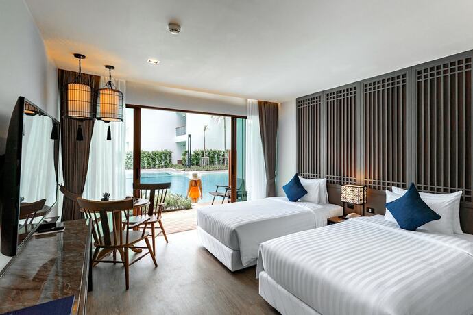 Imagen de la habitación del Hotel Bella Nara Phuket Naiyang Beach. Foto 11