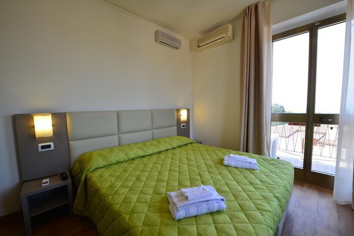 Imagen de la habitación del Hotel Bella Peschiera. Foto 12