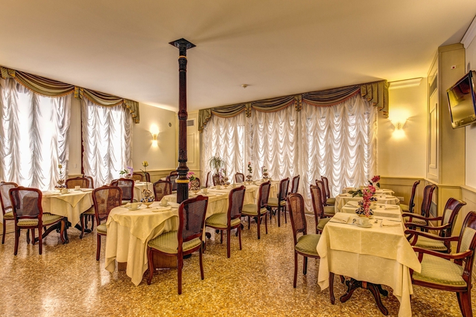 Imagen del bar/restaurante del Hotel Bella Venezia, Venecia. Foto 4