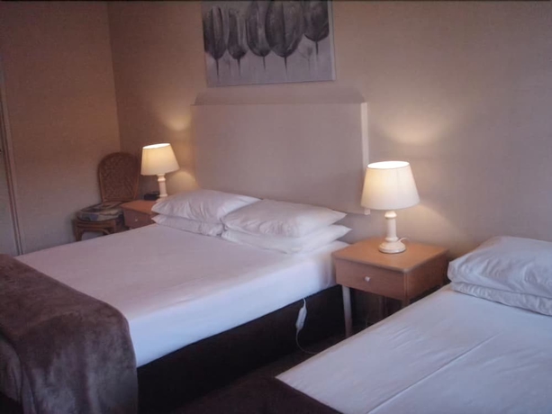 Imagen de la habitación del Hotel Bella Villa Motor Inn. Foto 4