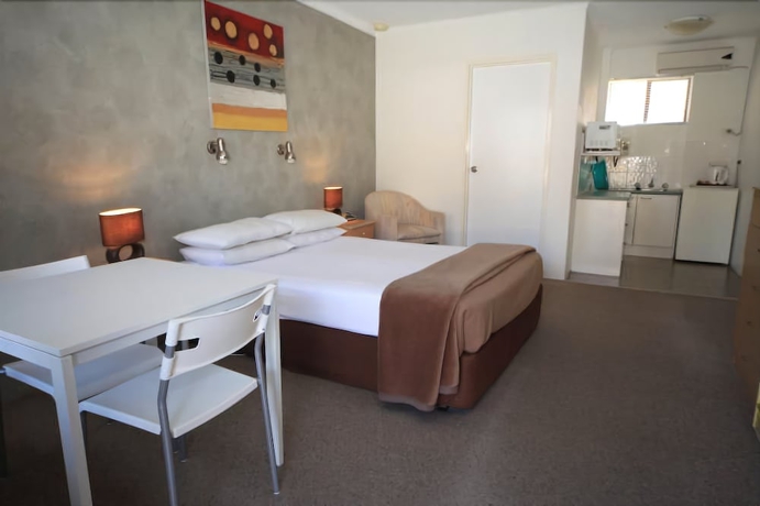 Imagen de la habitación del Hotel Bella Villa Motor Inn. Foto 5