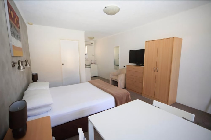 Imagen de la habitación del Hotel Bella Villa Motor Inn. Foto 9