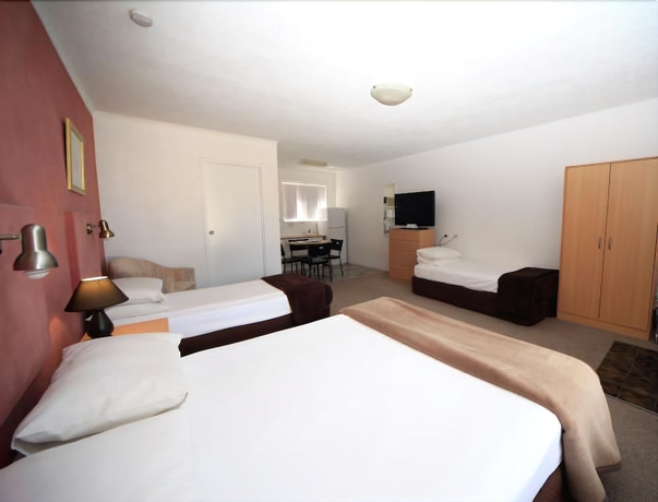 Imagen de la habitación del Hotel Bella Villa Motor Inn. Foto 10