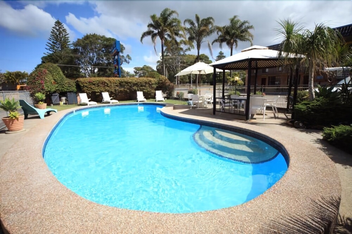 Imagen de la piscina del Hotel Bella Villa Motor Inn. Foto 14