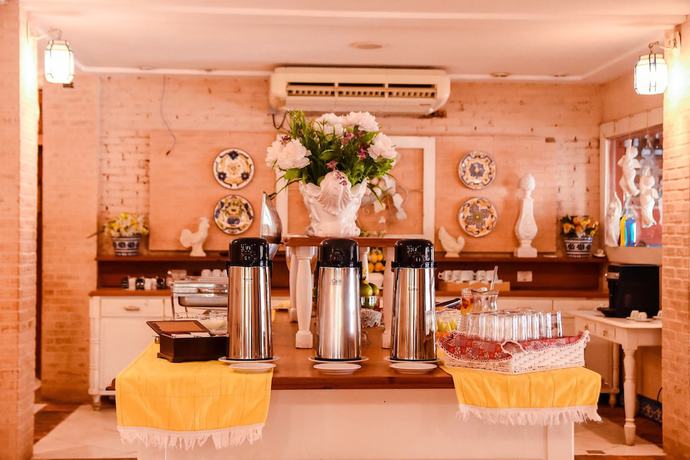 Imagen del bar/restaurante del Hotel Bella Villa Vitta. Foto 3