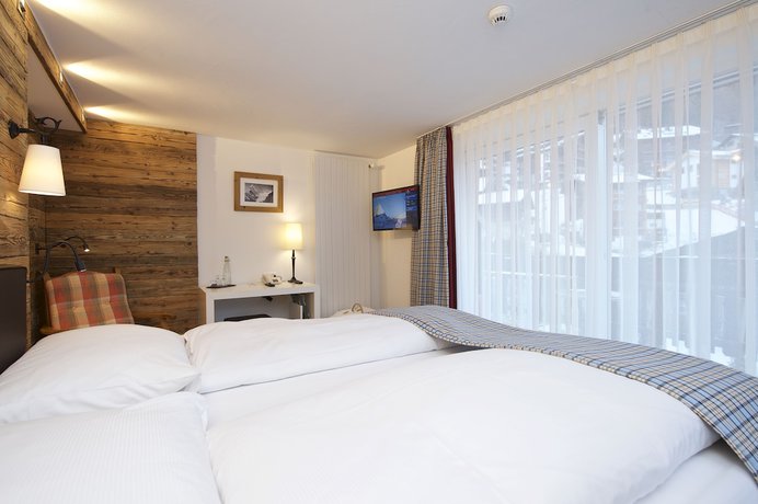 Imagen de la habitación del Hotel Bella Vista Zermatt. Foto 18