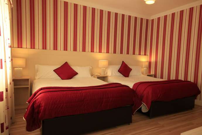 Imagen de la habitación del Hotel Bella Vista and Self Catering Suites. Foto 13
