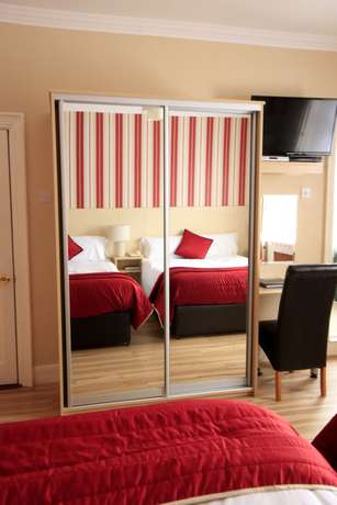 Imagen de la habitación del Hotel Bella Vista and Self Catering Suites. Foto 16