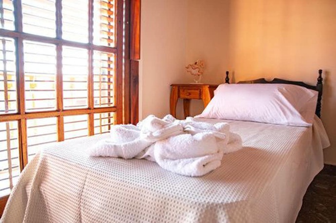 Imagen de la habitación del Hotel Bella Vita Boutique Lujan. Foto 3
