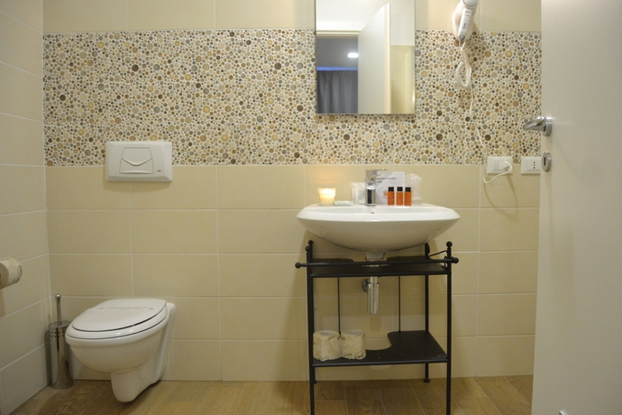 Imagen de la habitación del Hotel Bella Vita. Foto 13