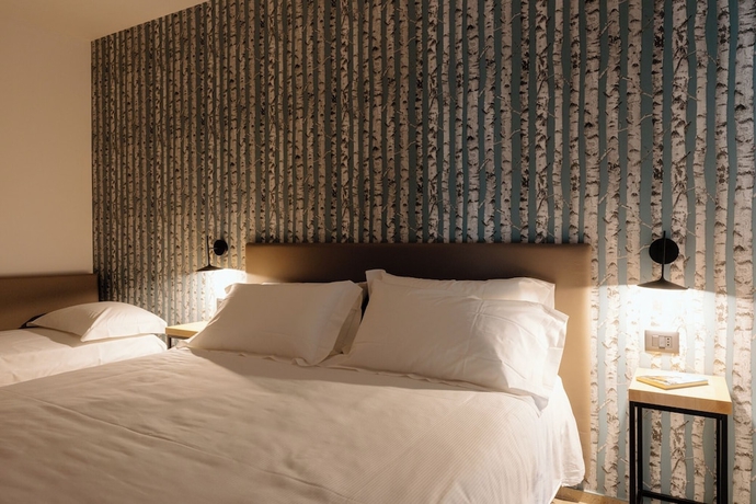 Imagen de la habitación del Hotel Belladonna. Foto 5