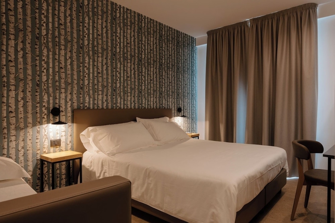 Imagen de la habitación del Hotel Belladonna. Foto 9