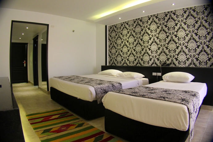 Imagen de la habitación del Hotel Bellagio Beach Resort. Foto 4