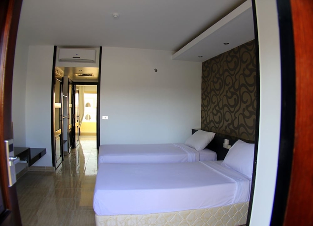 Imagen de la habitación del Hotel Bellagio Beach Resort. Foto 7